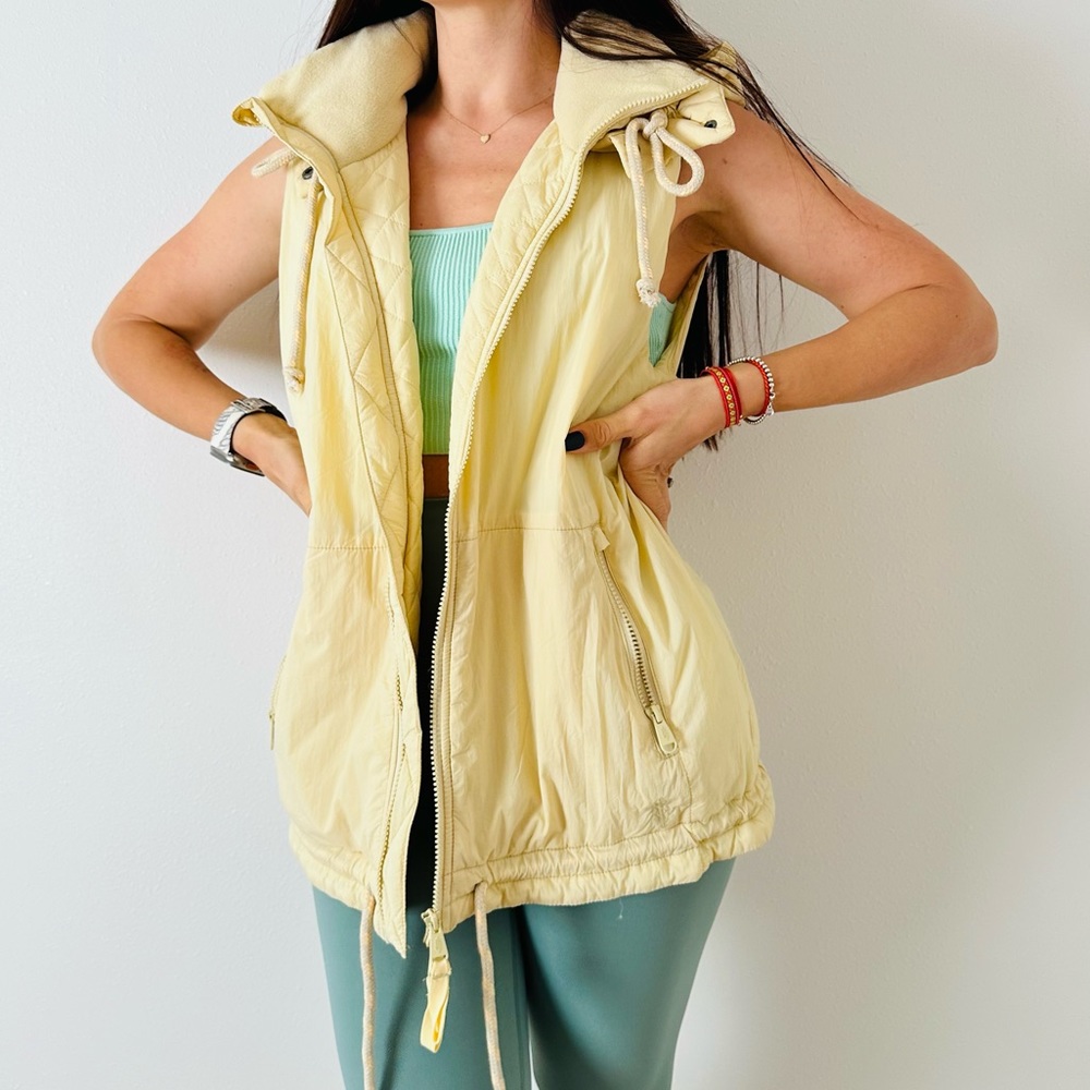 Free People care fp round & round recycled quilted puffer melon shell vest